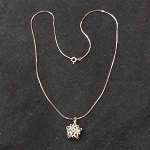 STERLING SILVER NECKLACE WITH PUFFED STAR PENDANT STUDDED W/ DARK BLUE SAPPHIRES